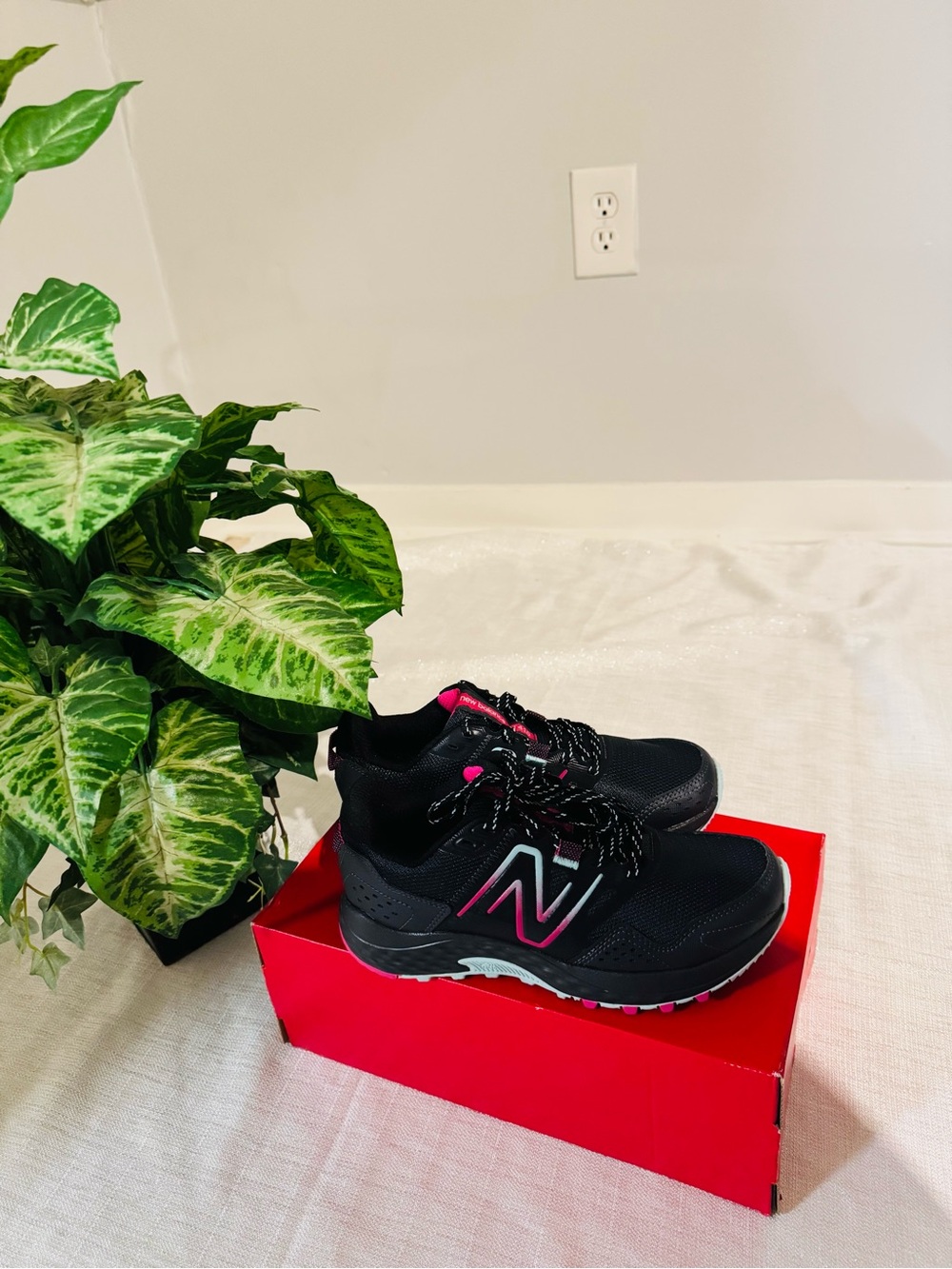 New Balance Black Sneakers with Pink Trim